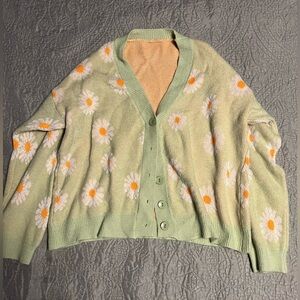 Green, orange, and white Sweater